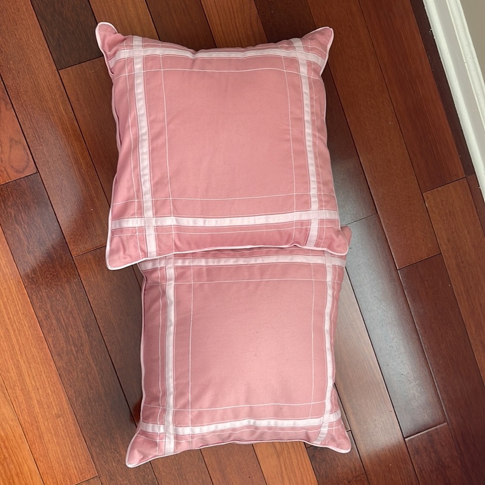 Throw pillows!  Pink w pale pink stitching and border